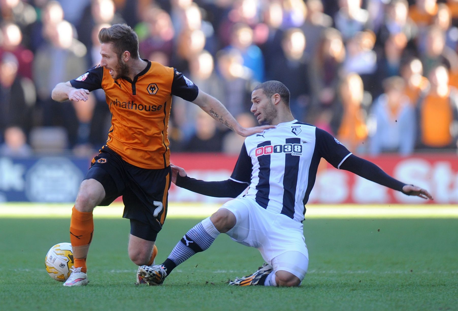 James-Henry-of-Wolverhampton-Wanderers-and-Adlene-Guedioura-of-Watford